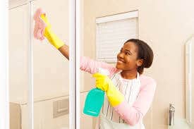 cleaning-the-shower-in-a-rental-house